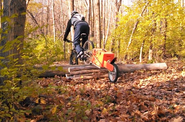 The reality check. If Mark can make it over without incident, towing a trailer with a chainsaw on it, then it's right for this trail.